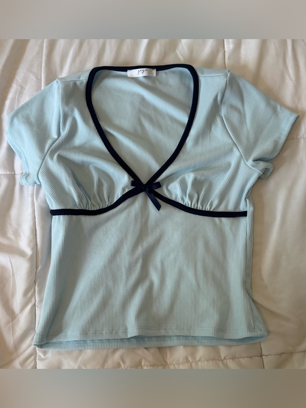 Light Blue Ribbed V-Neck Top with Navy Trim